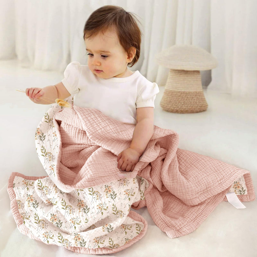 Lulumoon Muslin Blanket 47x47 folded for compact nursery storage.