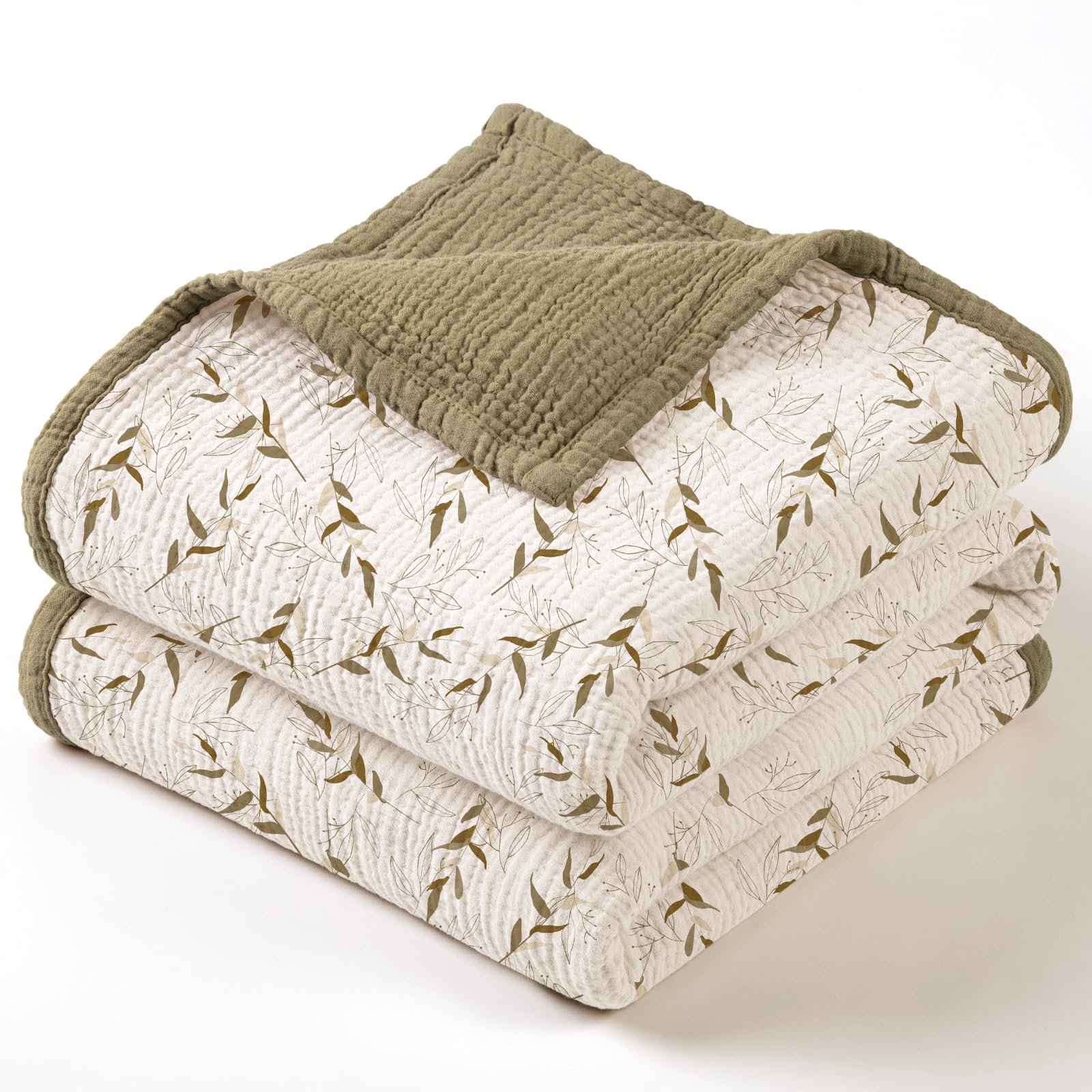 Lulumoon muslin blanket with brown branches folded for cozy home use