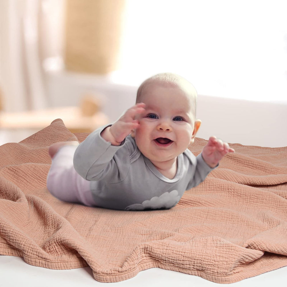 Lulumoon pink muslin blanket with gift-ready packaging suitable for baby showers.