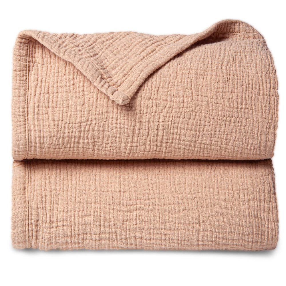 Lulumoon pink muslin blanket front view shows soft four-layer cotton texture for baby comfort.