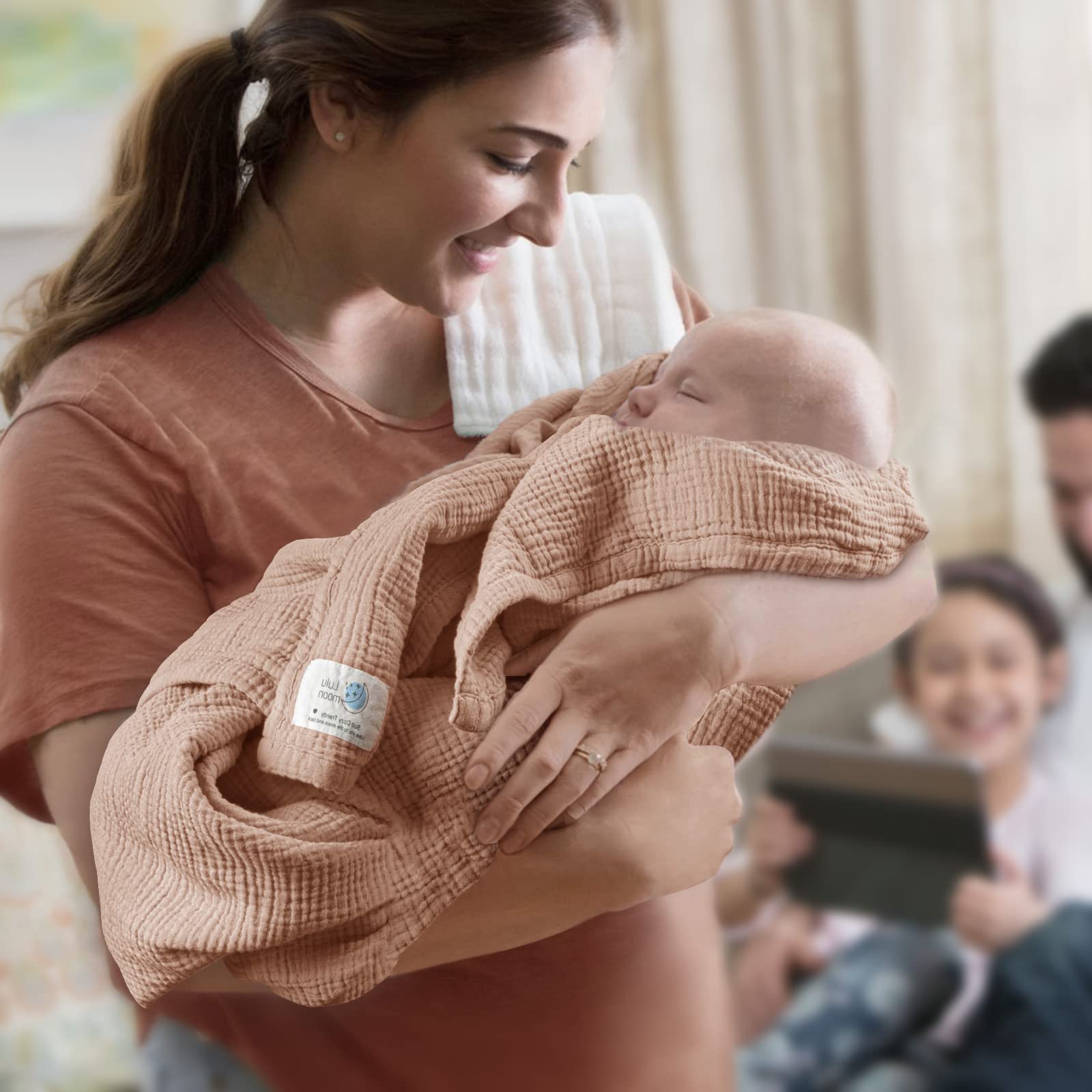 Lulumoon pink muslin blanket after washing reveals enhanced texture and beauty.