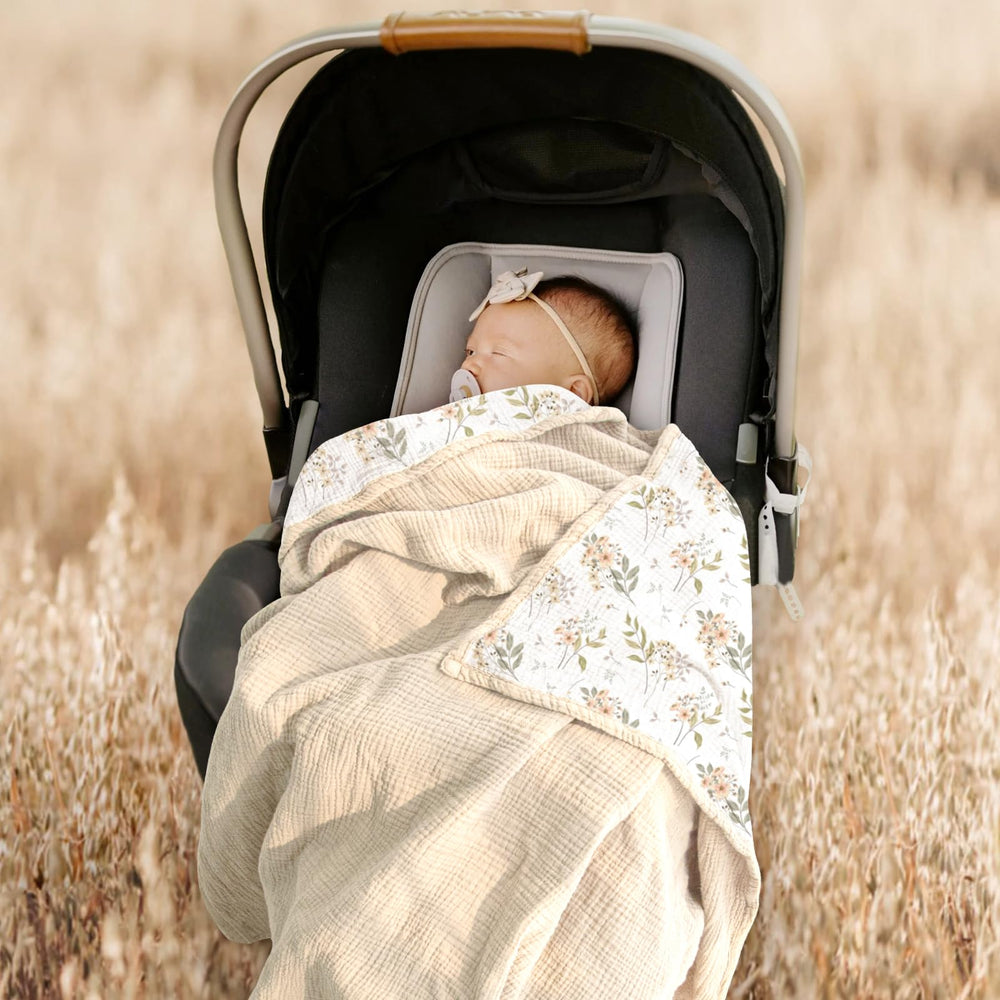 Lulumoon gift-ready muslin blanket, boxed packaging for baby showers.