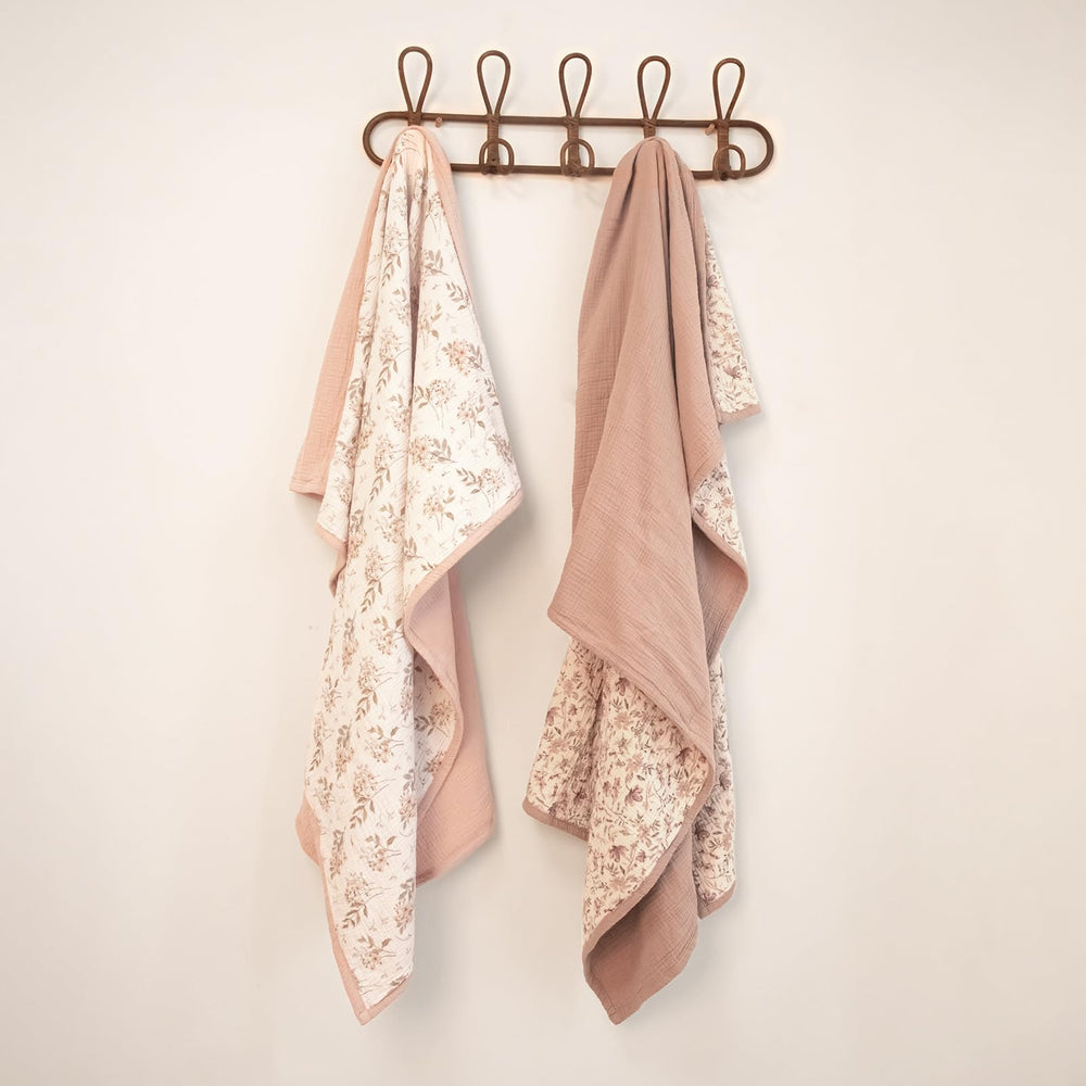 Lulumoon Muslin Blanket in a nursery beside a crib for cozy everyday use.