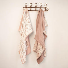 Lulumoon Muslin Blanket in a nursery beside a crib for cozy everyday use.