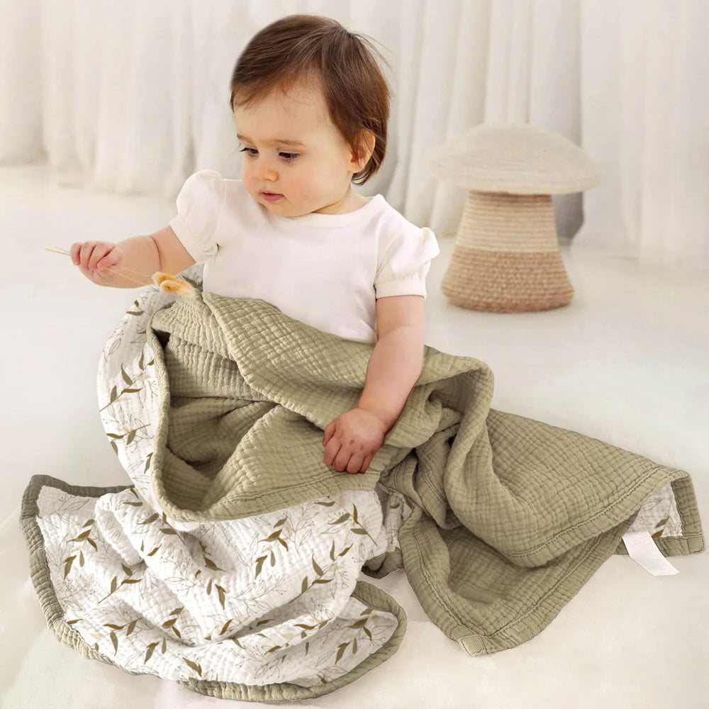 Lulumoon muslin baby blanket in nursery showing soft touch and breathability