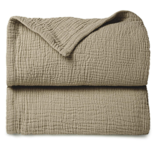 Lulumoon olive muslin blanket folded for gentle skin contact