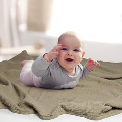 Lulumoon olive muslin blanket in stroller for travel