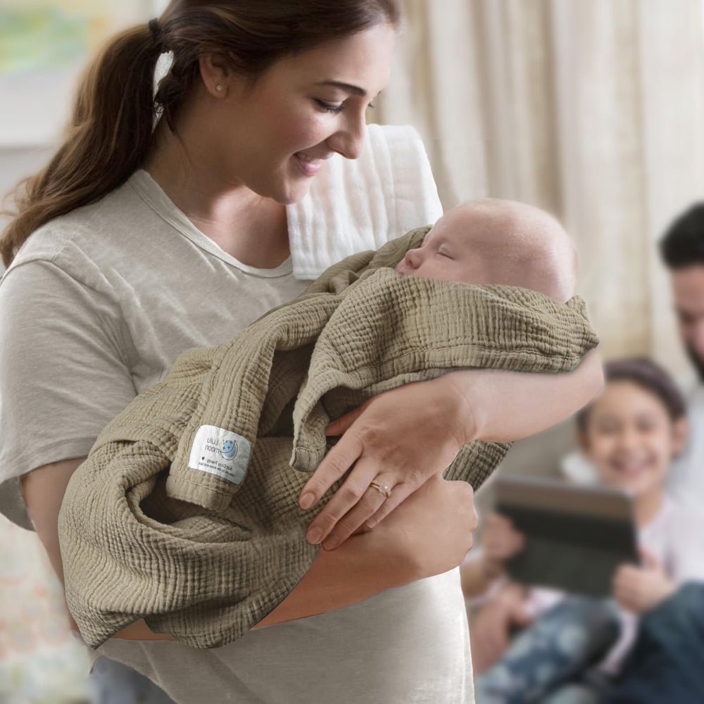 Lulumoon olive muslin blanket swaddling time for coziness