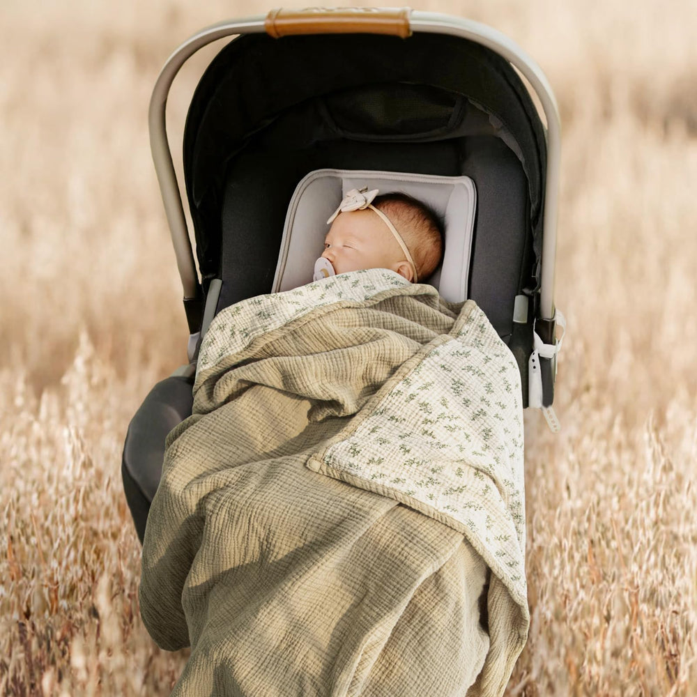 Lulumoon muslin blanket Olive Tree pattern ideal for newborn snuggle and stroller shade.