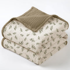 Lulumoon muslin blanket Olive Tree soft texture ready for cozy newborn snuggle and breathability.