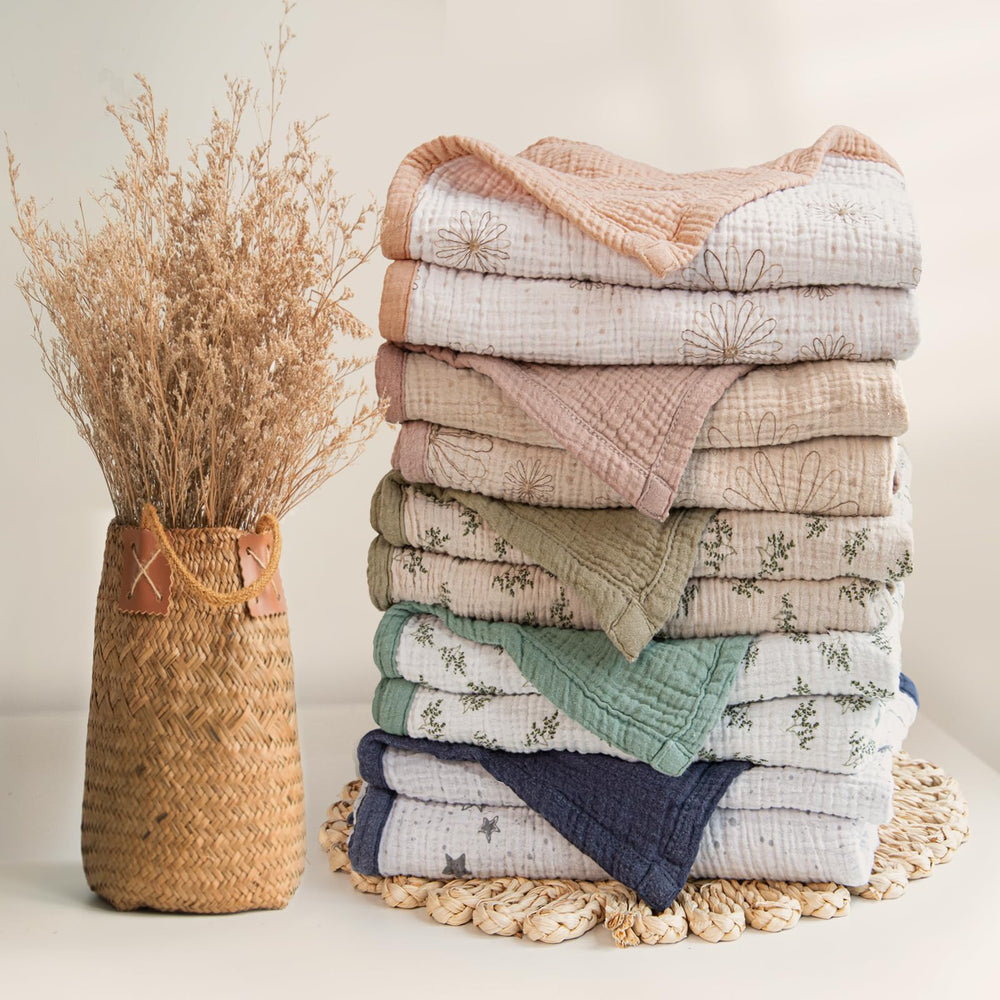 Lulumoon muslin blanket Olive Tree folds easily for travel and quick layer in stroller.