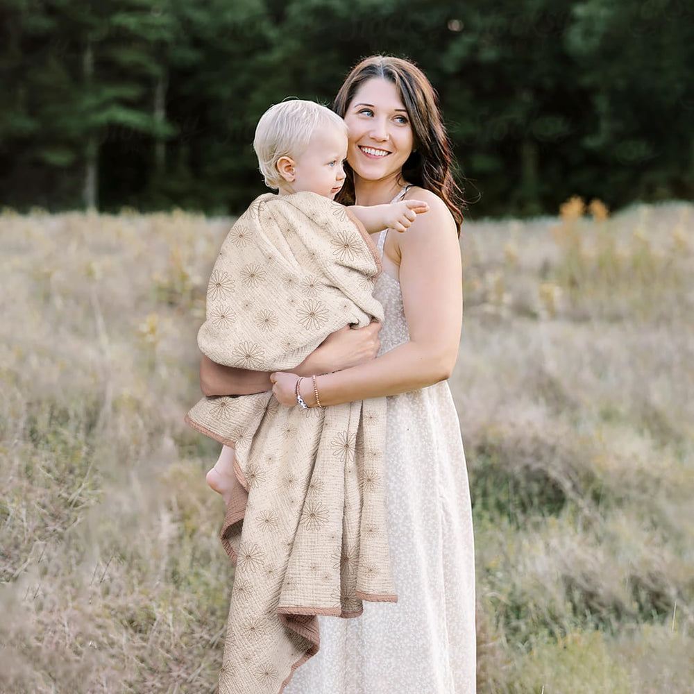 Lulumoon muslin blanket Sand Daisy folded for stroller sun-shield use