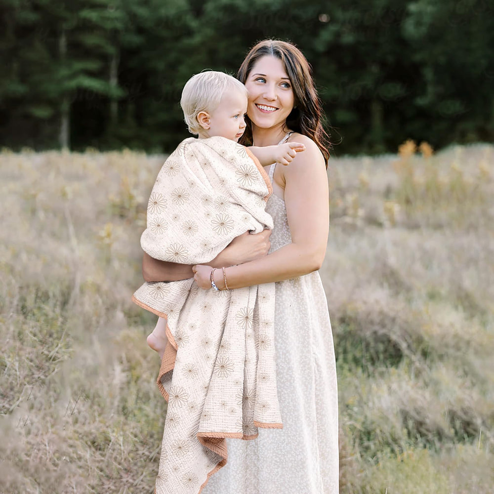 Lulumoon Pink Daisy blanket used as stroller sun shield
