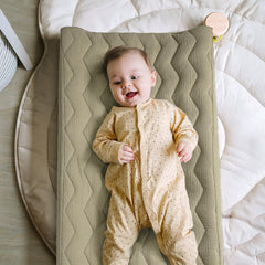 Lulumoon muslin changing pad cover elastic band keeping cover secure.