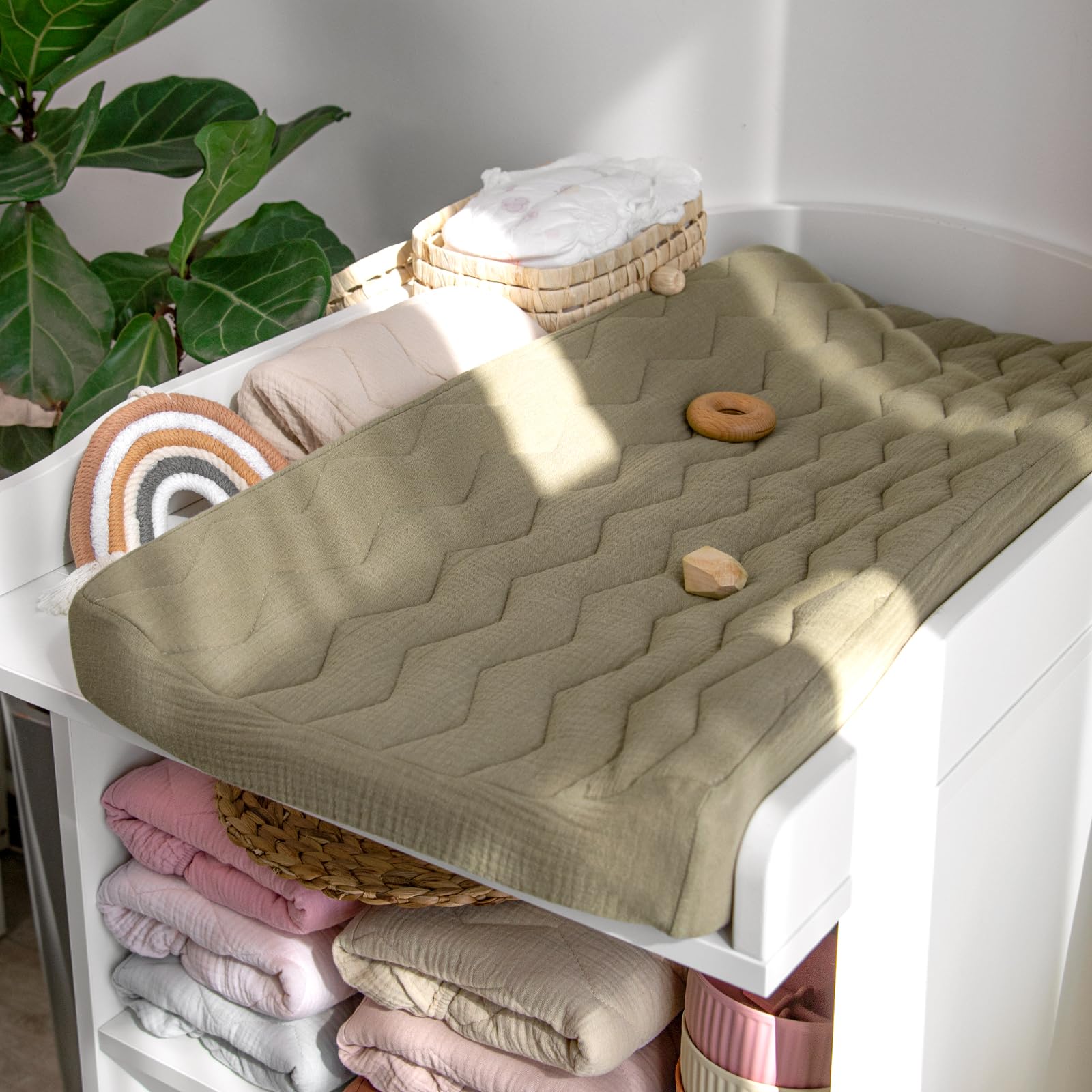 Lulumoon muslin changing pad cover quilted design on nursery mat.
