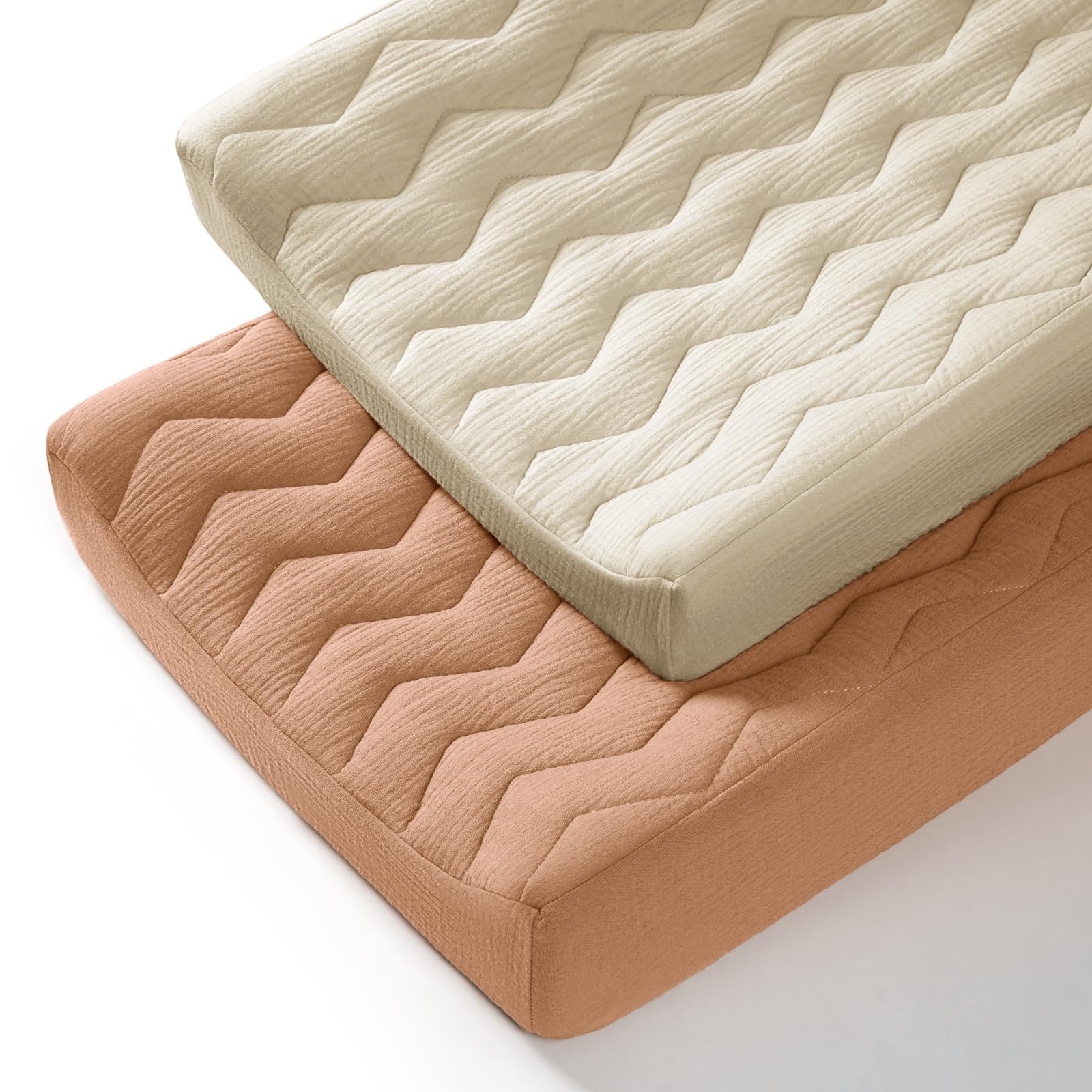 Lulumoon muslin changing pad cover with soft-touch fabric for baby's skin comfort.
