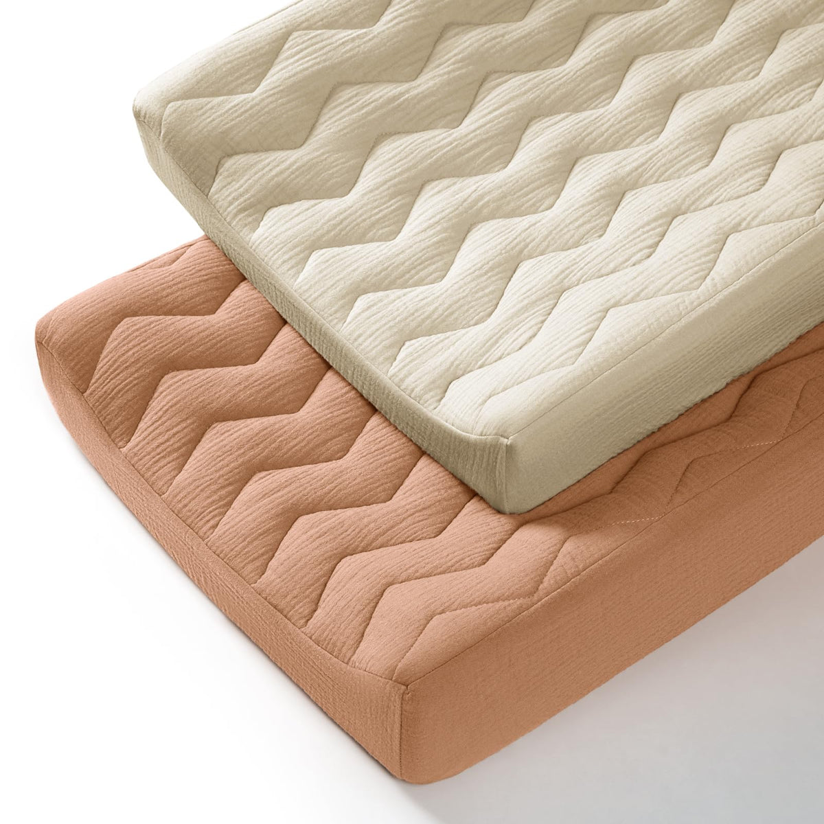 Lulumoon muslin changing pad cover with soft-touch fabric for baby's skin comfort.