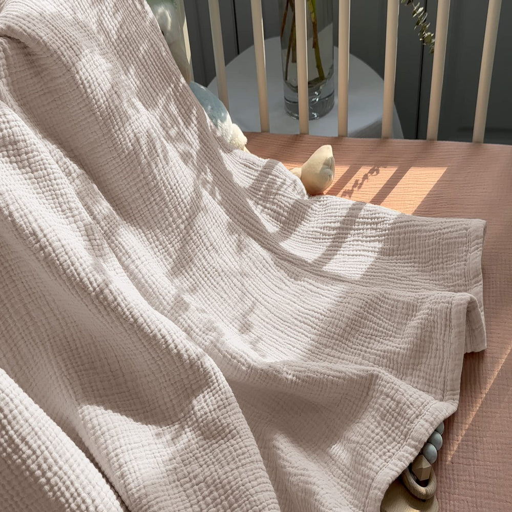 Lulumoon gift-ready packaging makes this crib blanket ideal shower present