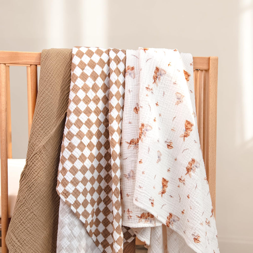 Lulumoon swaddle blanket breathable muslin — light, airy coverage.
