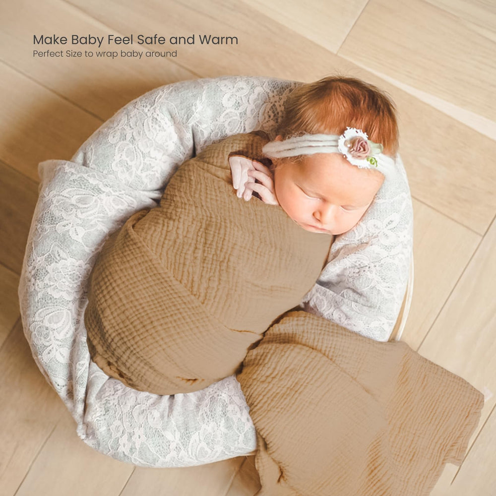 Lulumoon muslin swaddle — 40x40 inches for secure wrapping.