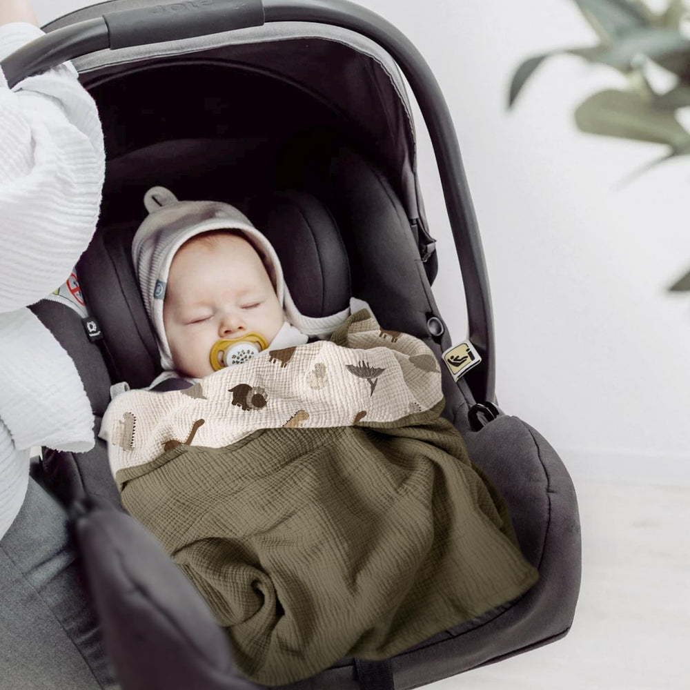 Lulumoon swaddle friendly muslin blanket; versatile for swaddling and calm naps.