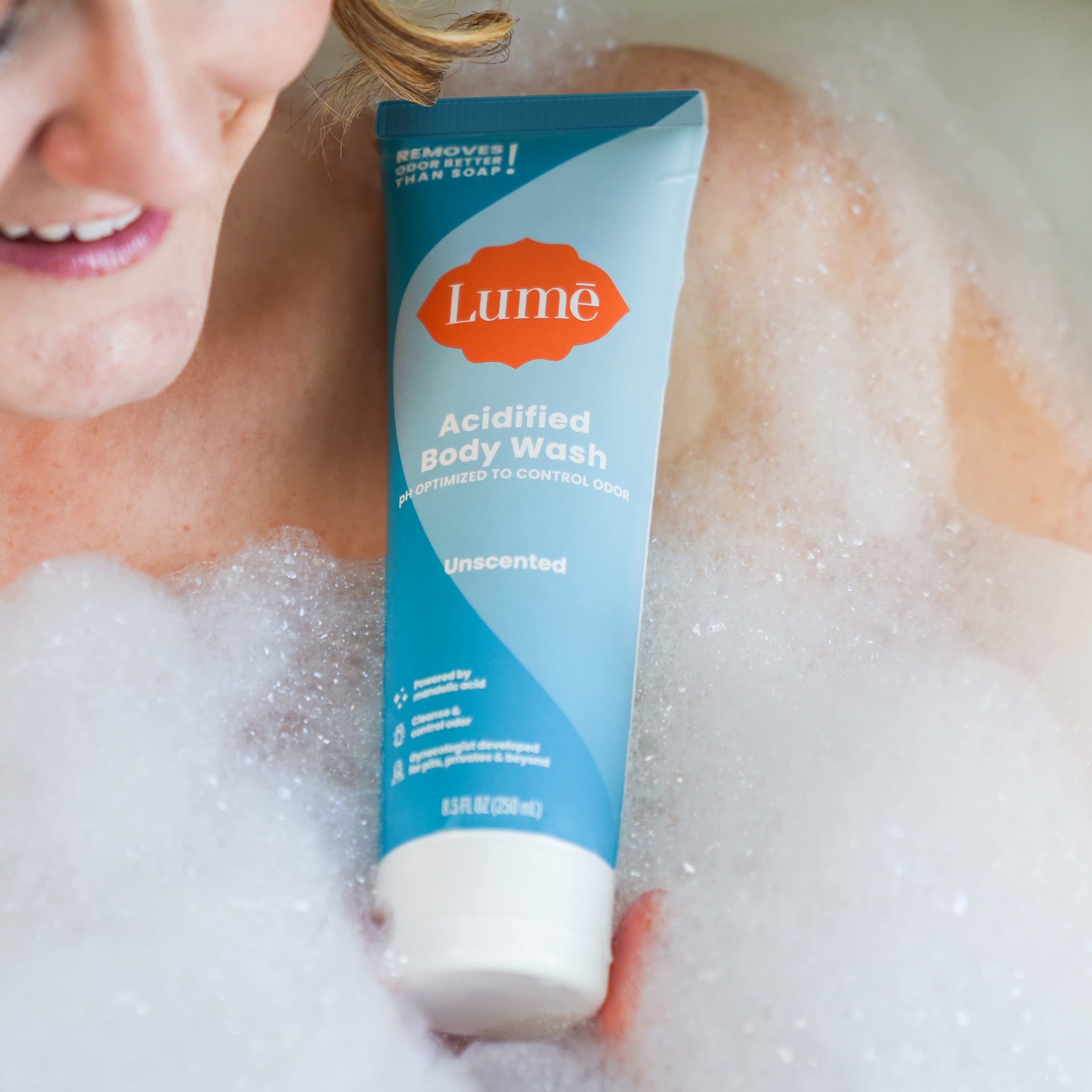 Close-up of Lume label showing unscented, skin-friendly formula.