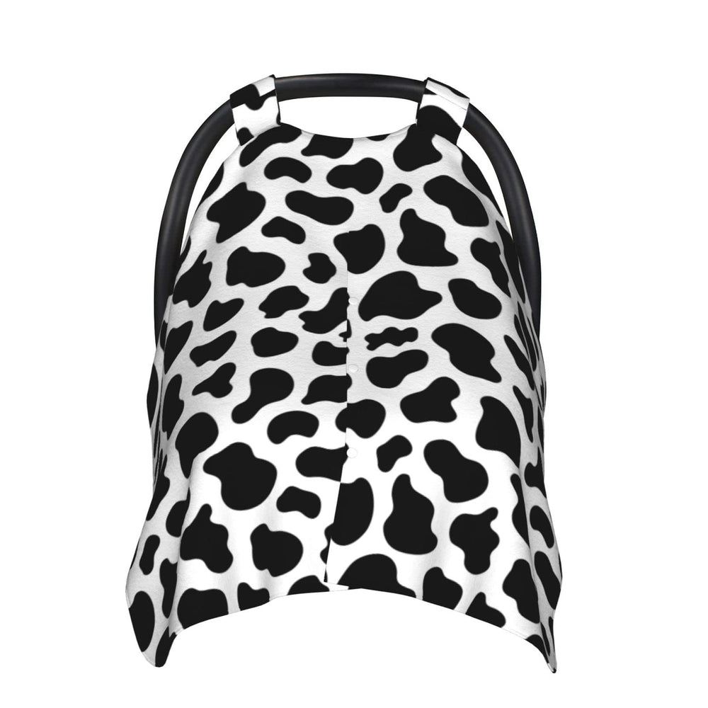 Lunepon cow-print canopy for baby seat creates a private sleeping space.