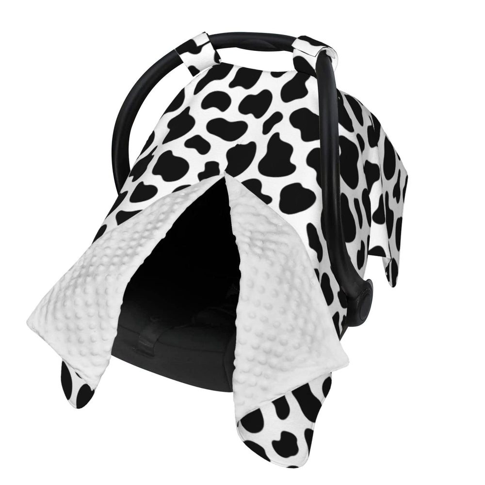 Lunepon cow-print car seat cover shields baby from sun and wind in the car.