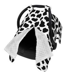 Lunepon cow-print car seat cover shields baby from sun and wind in the car.