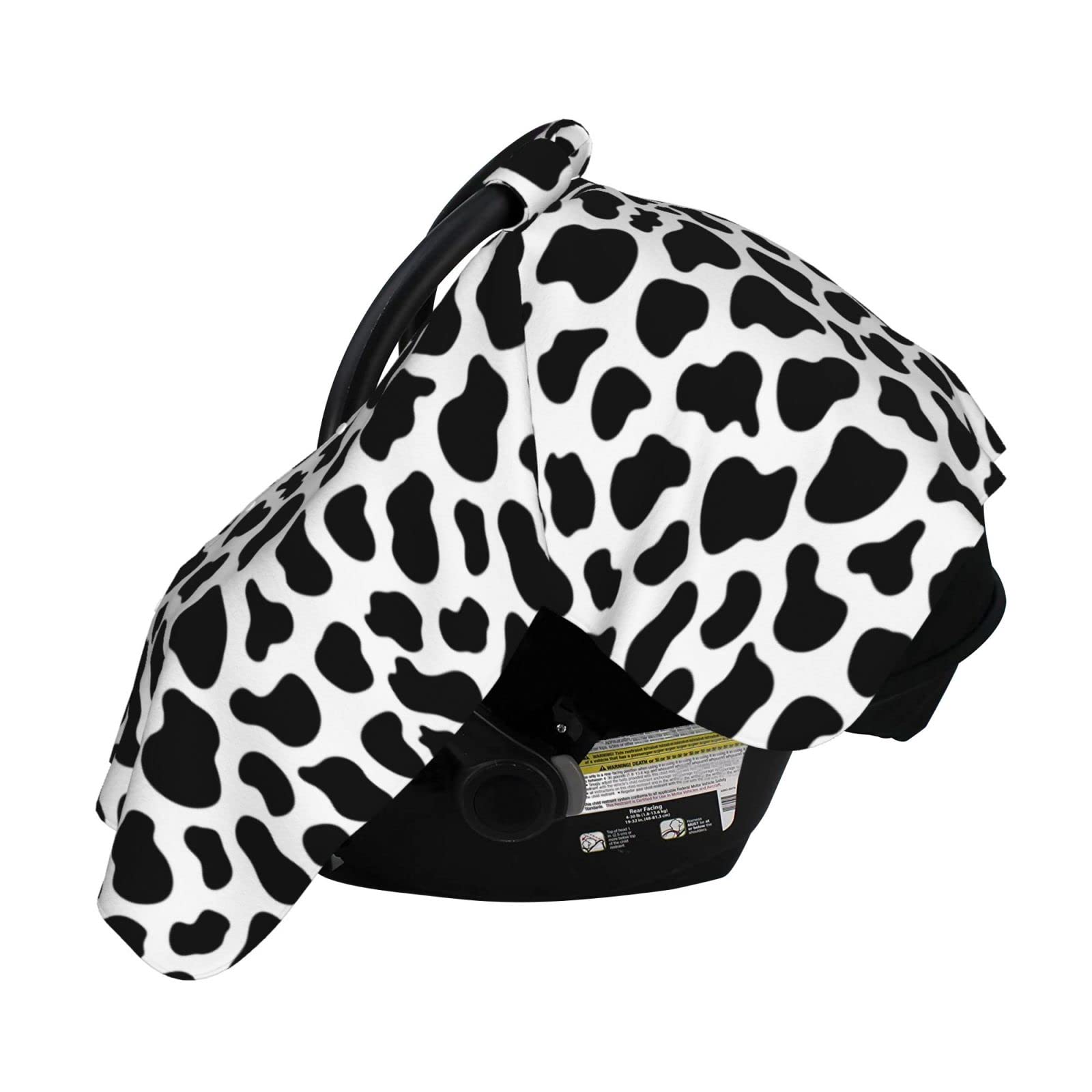 Lunepon cow-print nursing cover provides privacy during feeding.