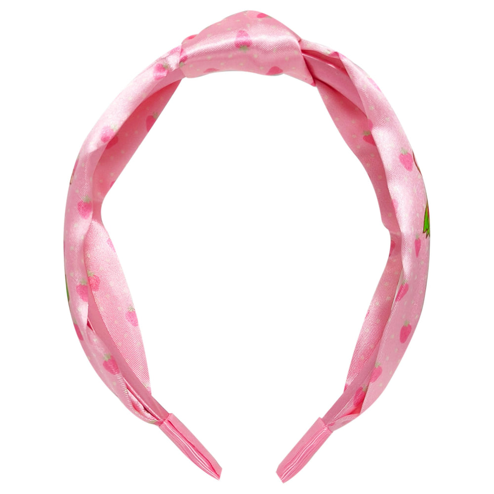 LUV HER Strawberry Shortcake knotted headband, closeup on character details, adds fun to outfits.