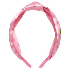 LUV HER Strawberry Shortcake knotted headband, closeup on character details, adds fun to outfits.