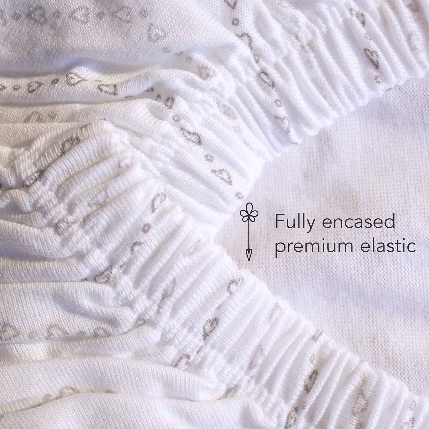 Luvberries Guava Lotus 24x42 crib sheet covers portable crib mattresses.
