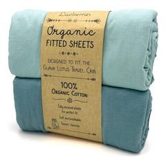 Luvberries Guava Lotus crib sheets in blue tones offer a calm, hypoallergenic sleep surface.