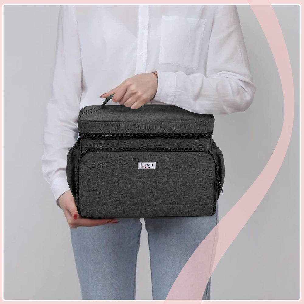 Side pockets for power cord, tissues, and storage bags in Luxja bag.