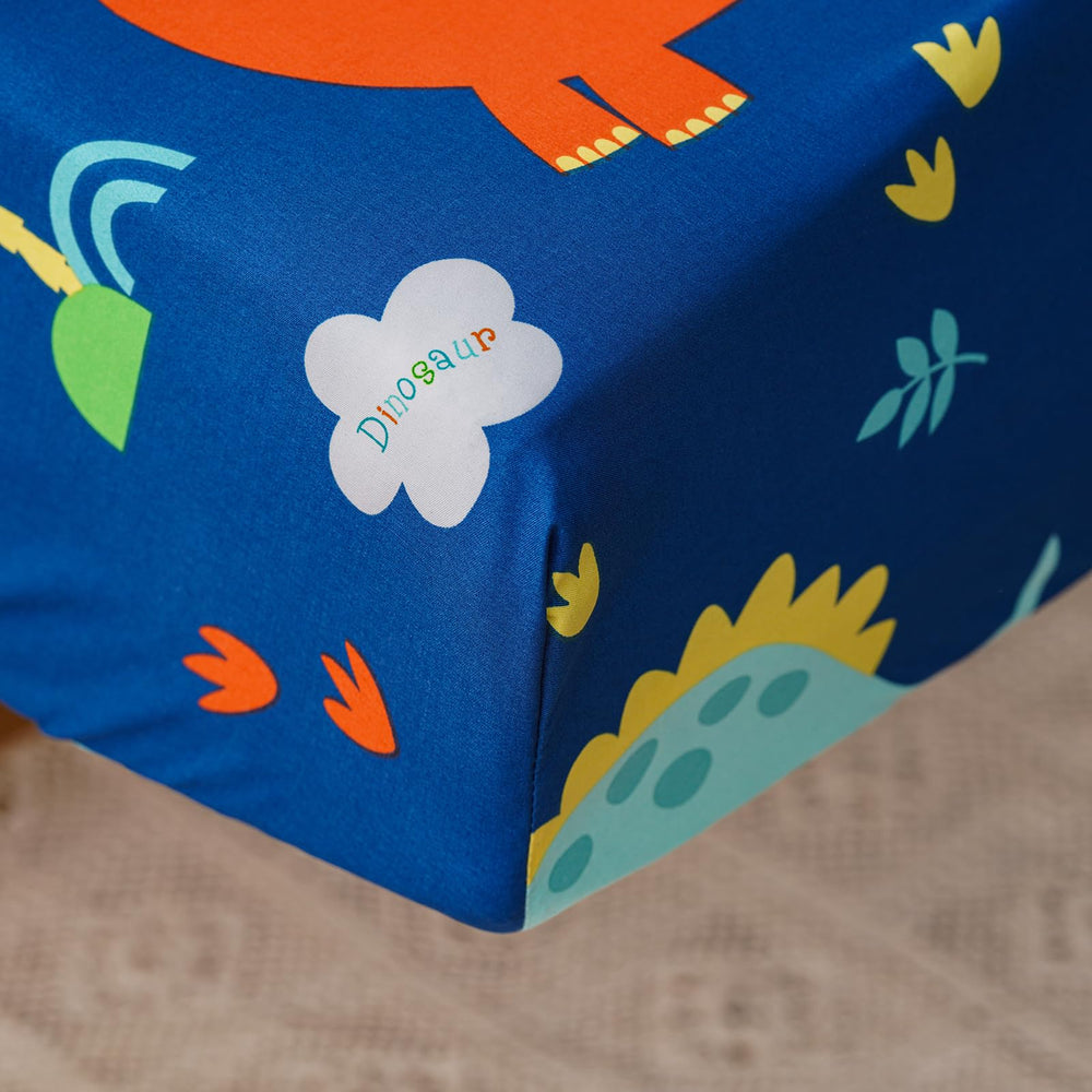 Luxlovery dinosaur-themed bedding in a kid's room setup for play and rest.