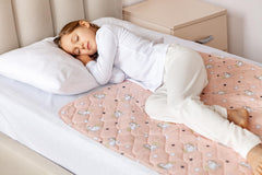 Lynmark Unicorn top-layer protector offers cozy, absorbent surface for night-time potty training.