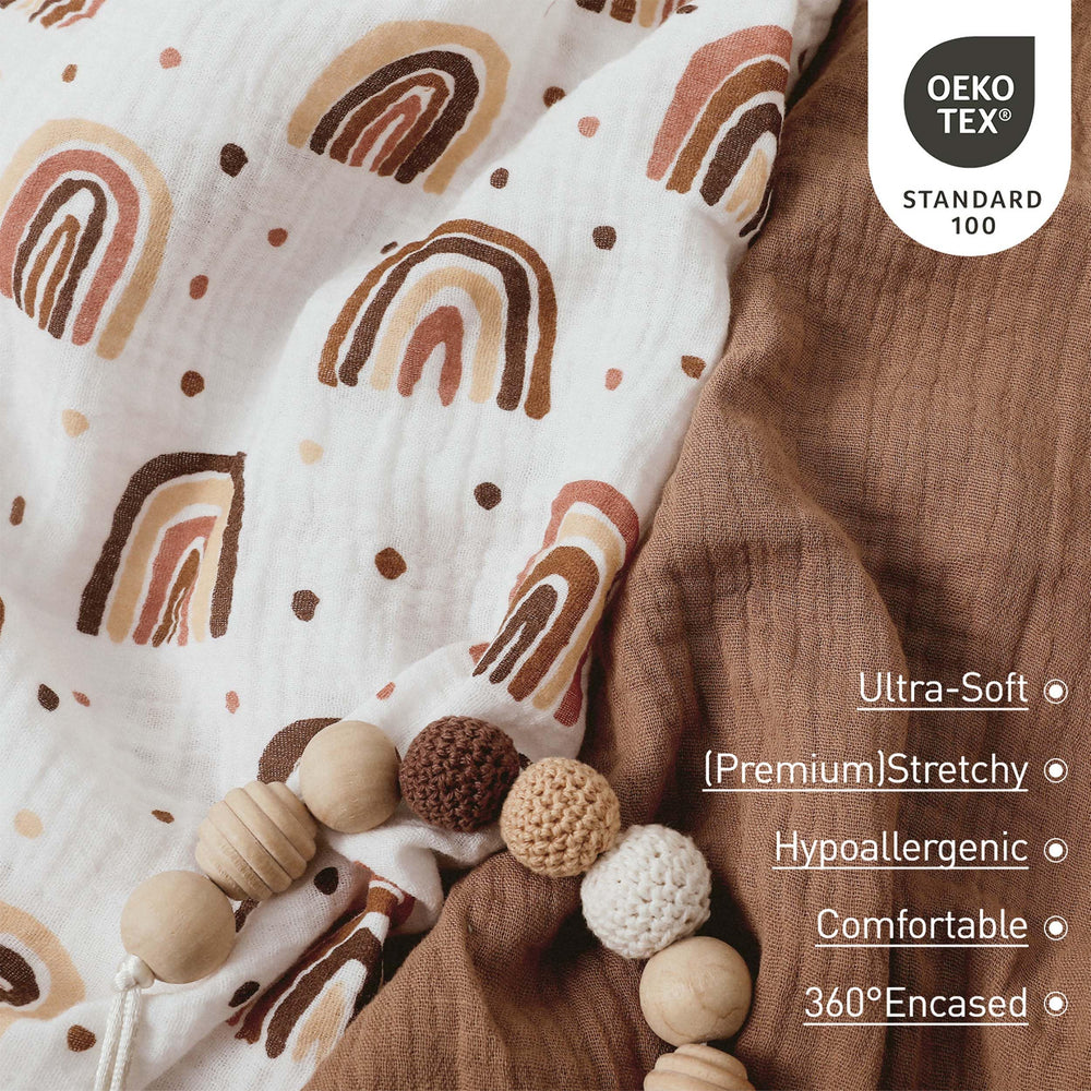 LYRICHOM BABY bassinet sheet in soft rainbow print enhances cozy sleep environment.