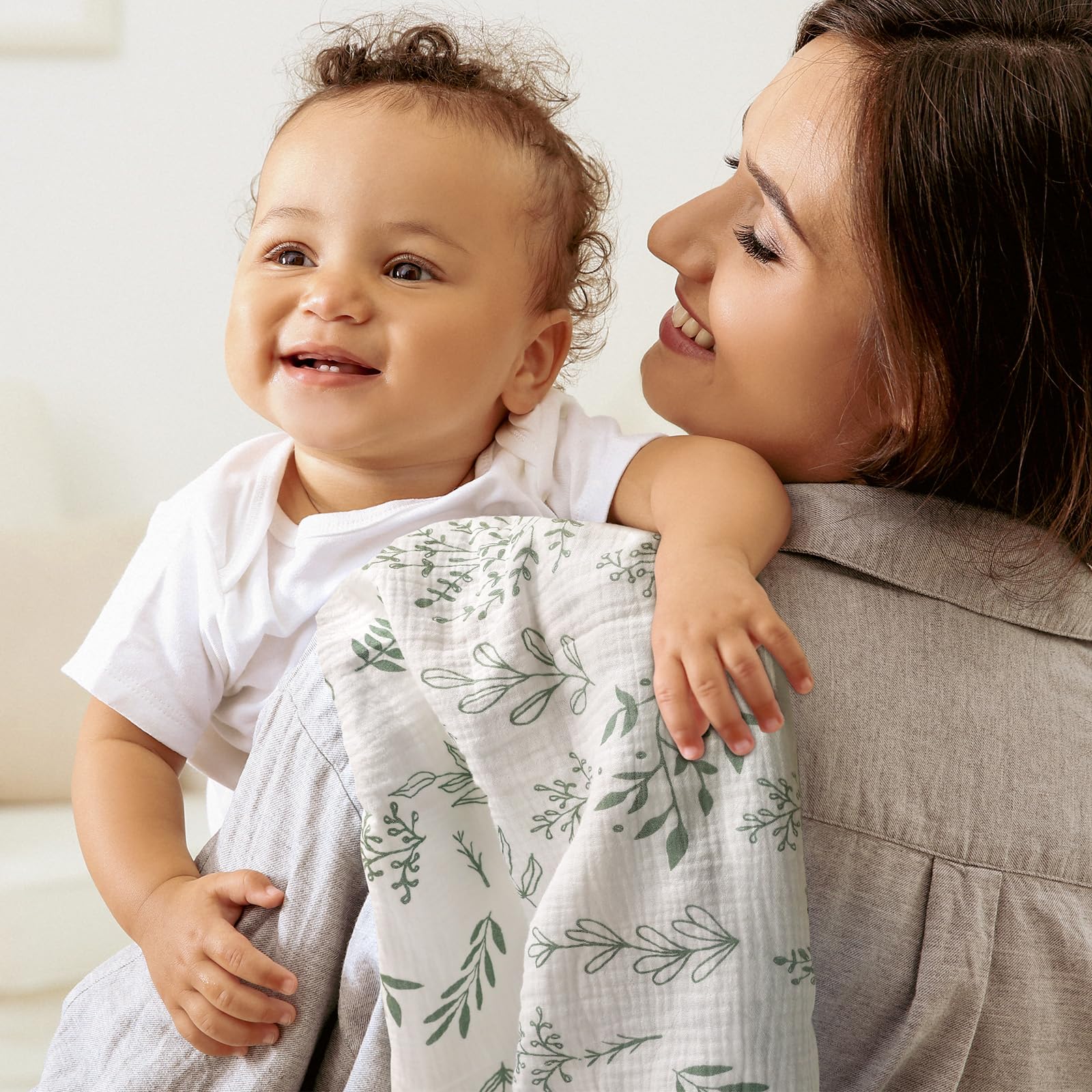 LYRICHOM BABY muslin swaddle closeup reveals soft fabric texture and neat stitching.