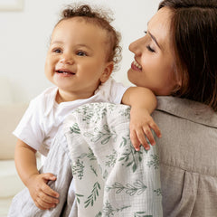 LYRICHOM BABY muslin swaddle closeup reveals soft fabric texture and neat stitching.