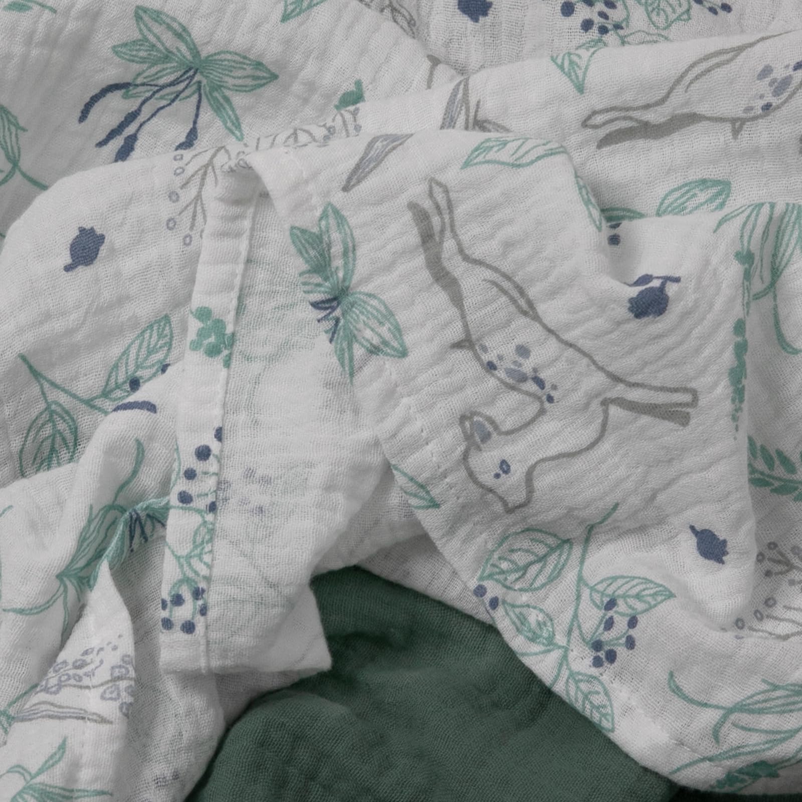 Neutral fawn and leaves print complements any outfit and gender.