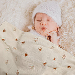 LYRICHOM BABY swaddle blanket supports tummy time with airy weave.