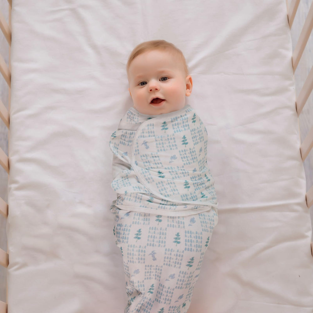 LYRICHOM BABY swaddle sacks in soft organic cotton fabric for gentle skin contact.