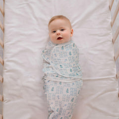 LYRICHOM BABY swaddle sacks in soft organic cotton fabric for gentle skin contact.