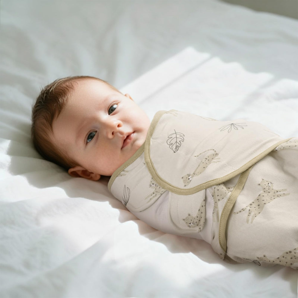 LYRICHOM BABY swaddle wings with adjustable fasteners for a snug, womb-like fit.