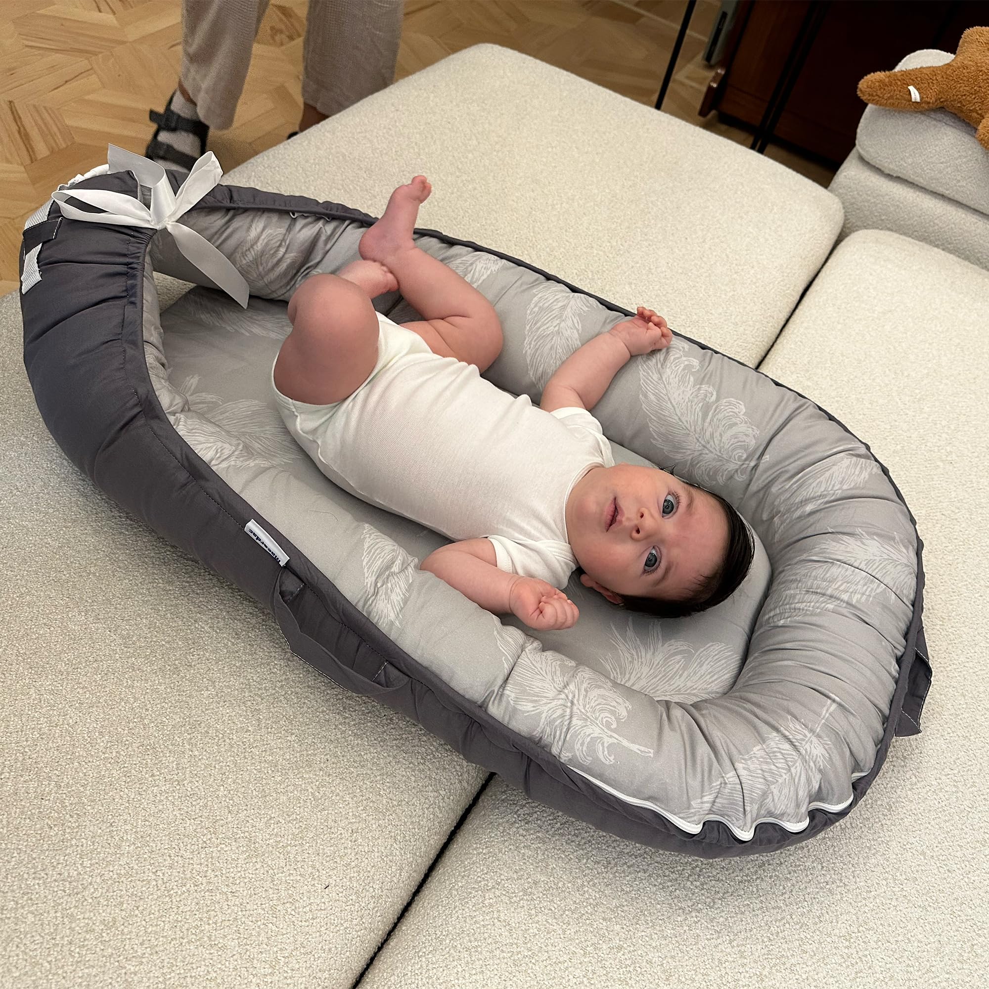 Macardac Baby Nest double-sided design showing two colors for versatility