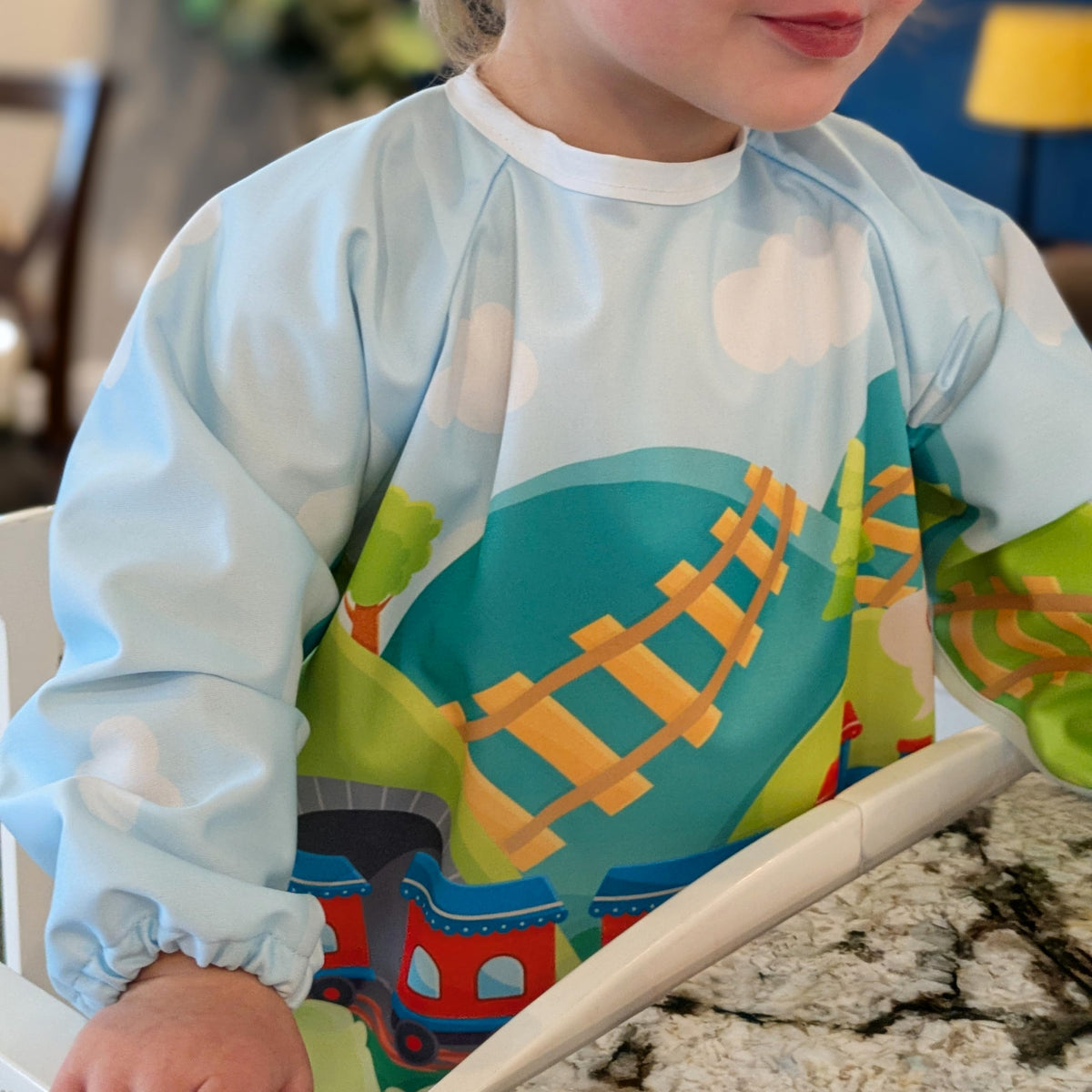 Madrona Train Bib waterproof fabric blocks spills during messy meals