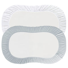 Elastic band closeup showing snug fit on bassinet mattress by Magik & Kover