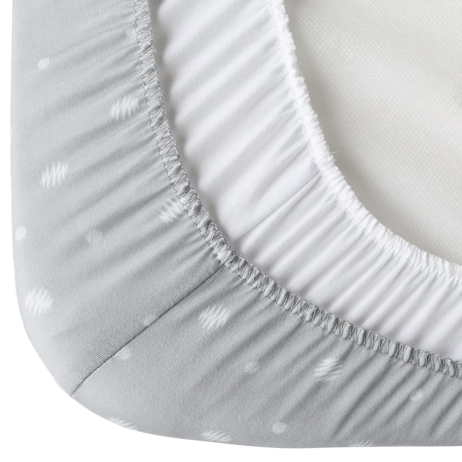 Magik & Kover bassinet sheets in white and grey ball design to match nursery decor