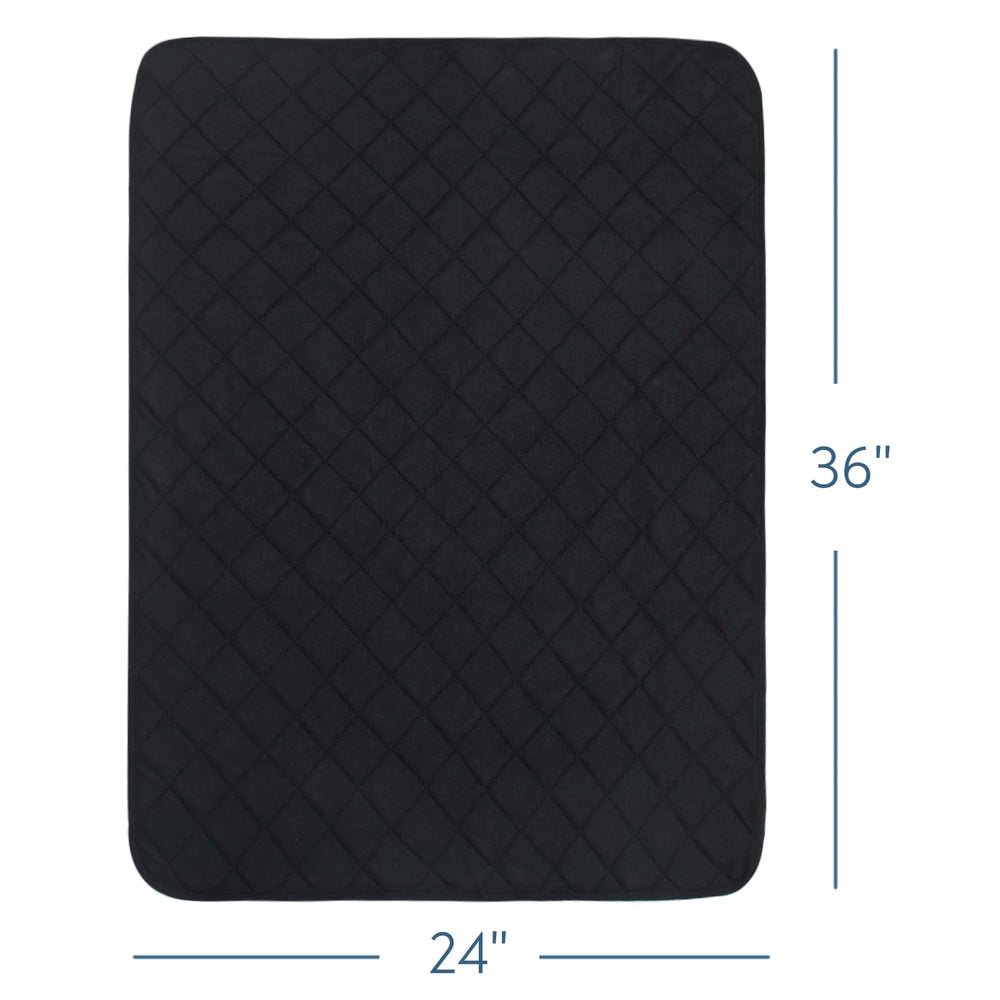 Magik & Kover bed pad on sofa demonstrates versatile usage